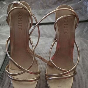 SCHUTZ Metallic Gold Strappy Platform Sandals. It fits very true to the size.
